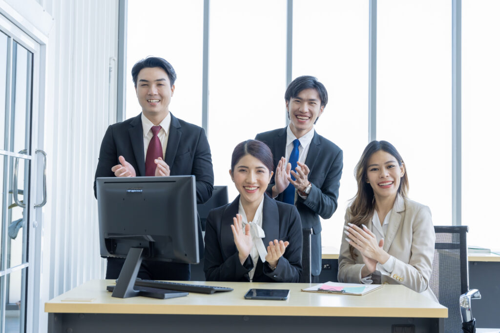 A group of young Asian businessmen Talking and planning work hap